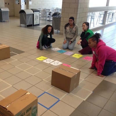 Girls Math & Science Day 2017- Learning to code by guiding their friends through a maze